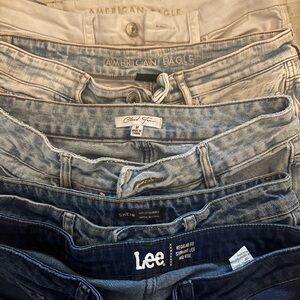 FIVE PAIRS OF JEANS STACK